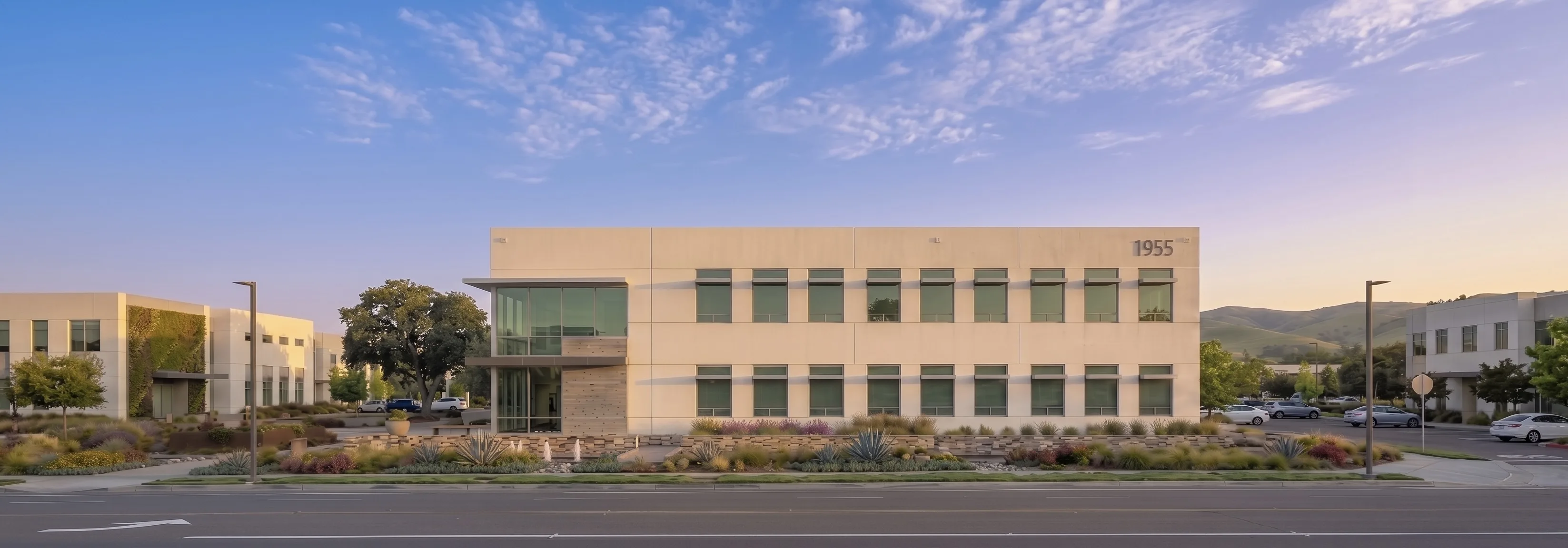 Commercial building frontage with a clean, maintained landscape presentation.