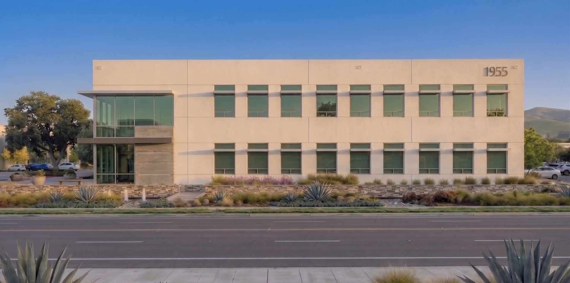 Commercial building frontage with a clean, maintained landscape presentation.